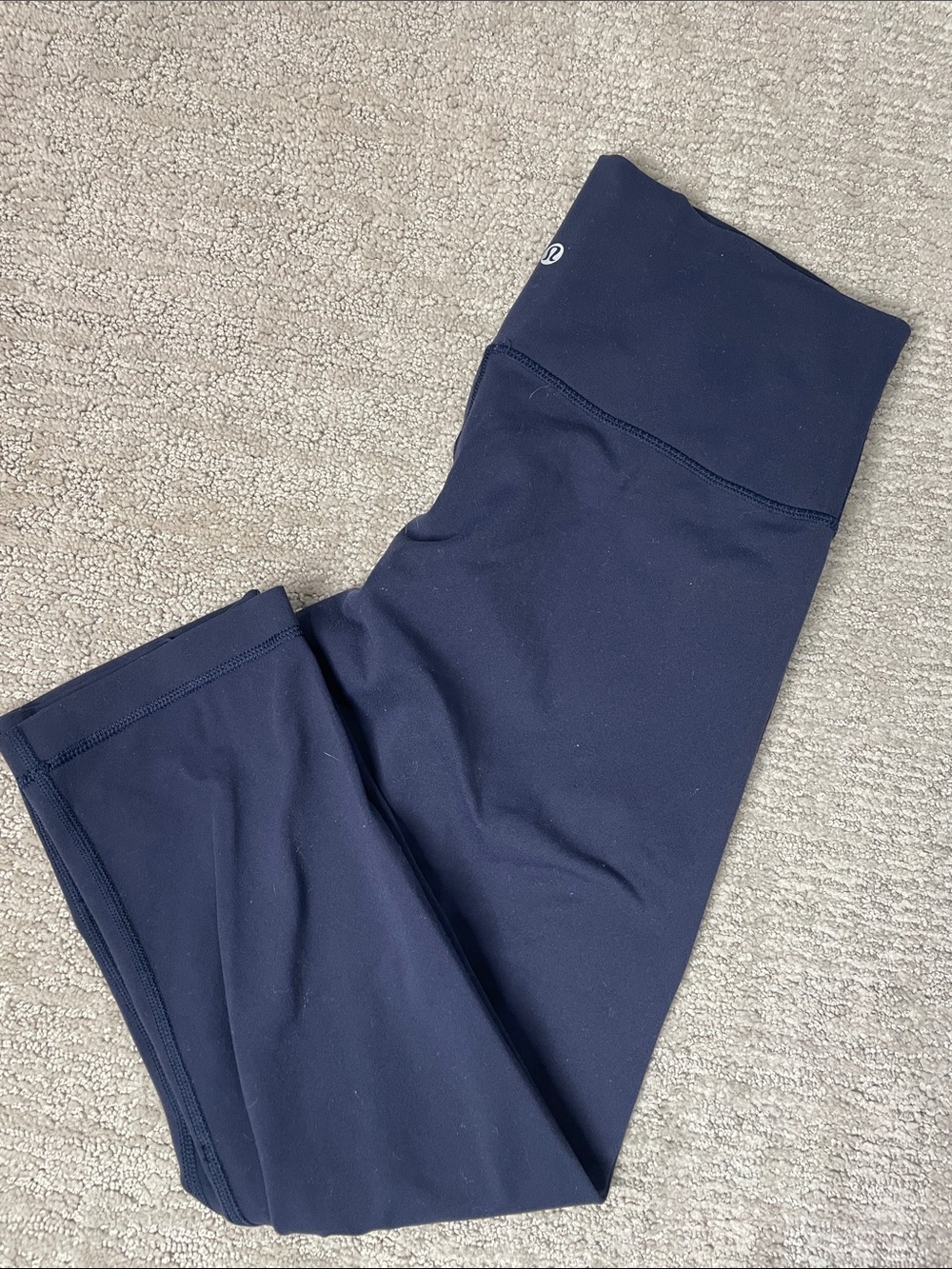 Lululemon Wunder Under high-rise crop leggings in a navy blue color